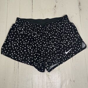 Nike Women's Black Star-Print Athletic Shorts with White Swoosh